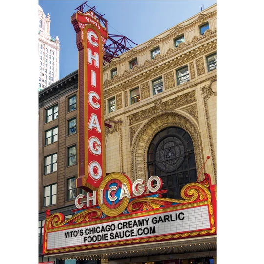 Chicago Theatre marquee reading Vito's Chicago Creamy Garlic Foodie Sauce